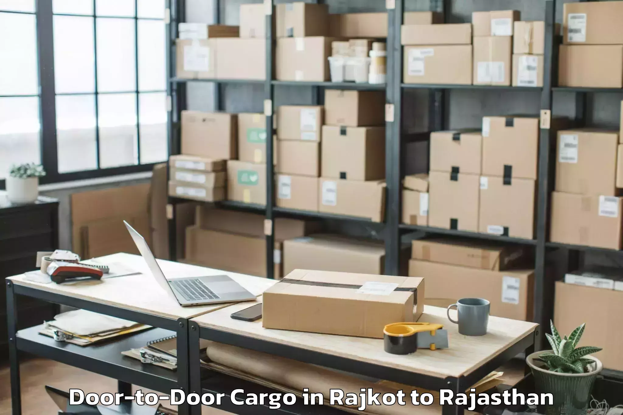 Trusted Rajkot to Central University Of Rajastha Door To Door Cargo